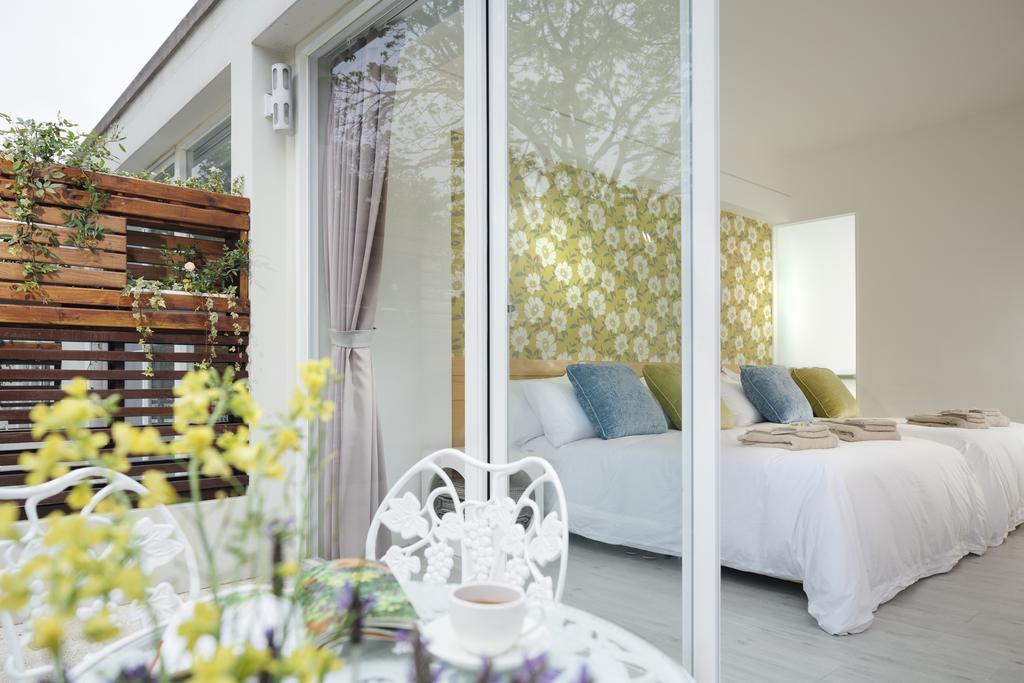 Ferienwohnung Around The Tree Manor Shitan Zimmer foto